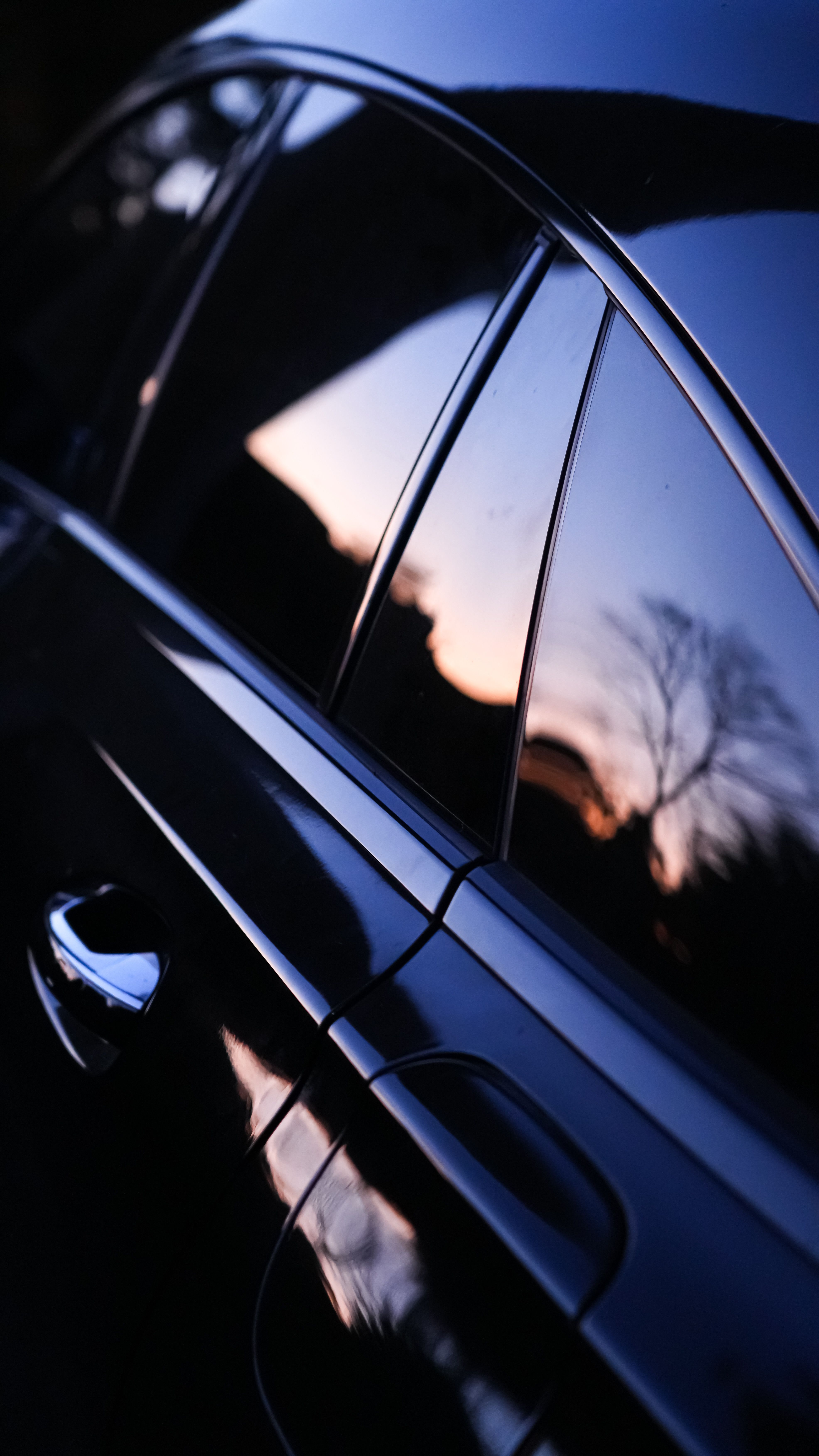 Tinted side windows at dusk